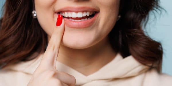 Young woman with dental sealants and a healthy smile in Sevierville, TN